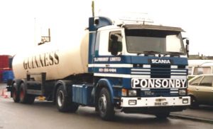 D. J Ponsonby Ltd Scania Truck coupled to Guinness Tanker en-route to London Brewery in 1984